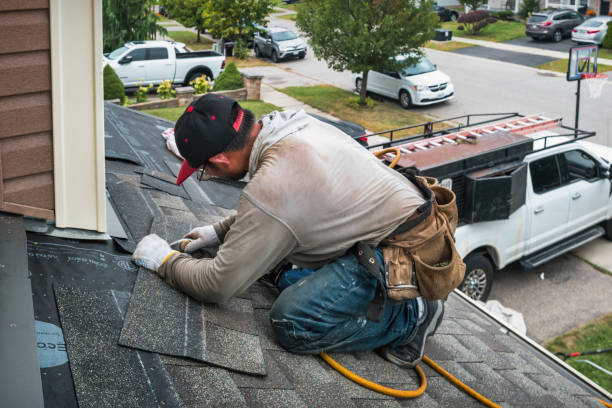 Professional Emergency Roof Repair technician working in Fuquay-Varina, NC